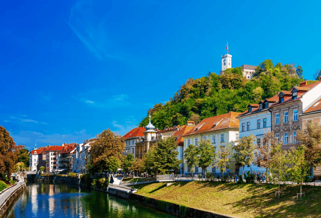 Urban Oases 2026: Explore the World’s Top Green Cities & Parks 8 Ljubljana village with traditional houses and green trees.