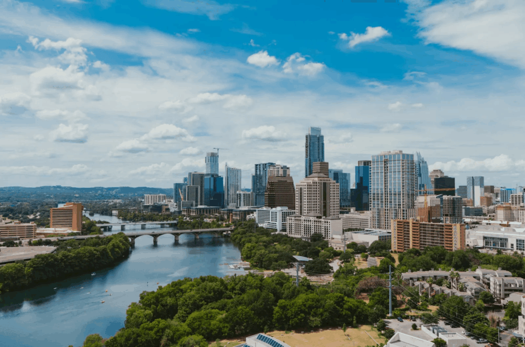 Urban Oases 2026: Explore the World’s Top Green Cities & Parks 11 Austin with river, skyline, and green parks.