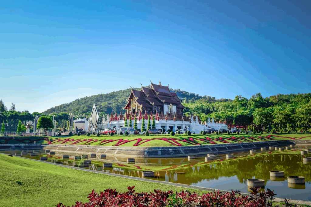 Urban Oases 2026: Explore the World’s Top Green Cities & Parks 12 Chiang Mai with buildings, water, green fields, forests, and hills.