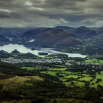 English countryside in the Lake District with rolling hills and peaceful lakes