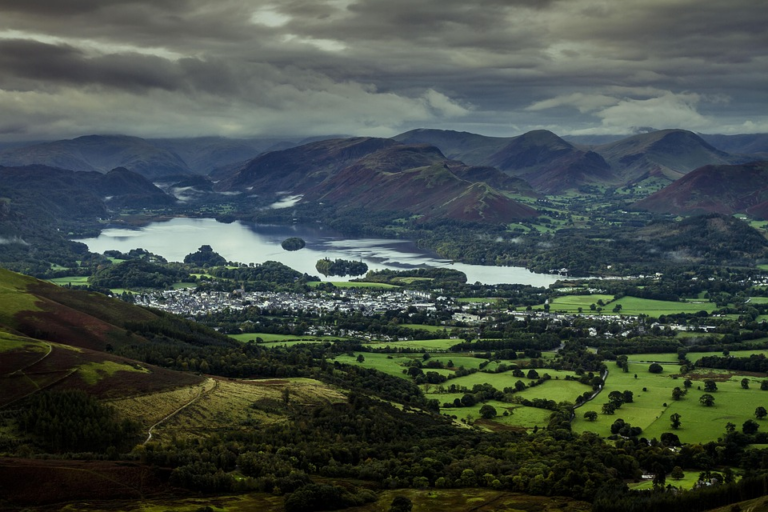 The 10 Most Scenic and Peaceful Countryside Destinations Around the World 9 English countryside in the Lake District with rolling hills and peaceful lakes