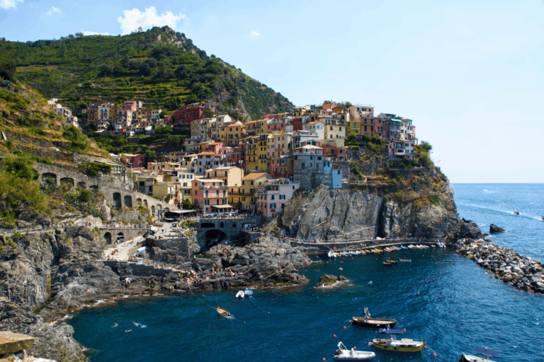 What is the Best Way to Travel Through Italy? 2025 Guide 10 cinque-terre-italy. buildings near body of water during daytime