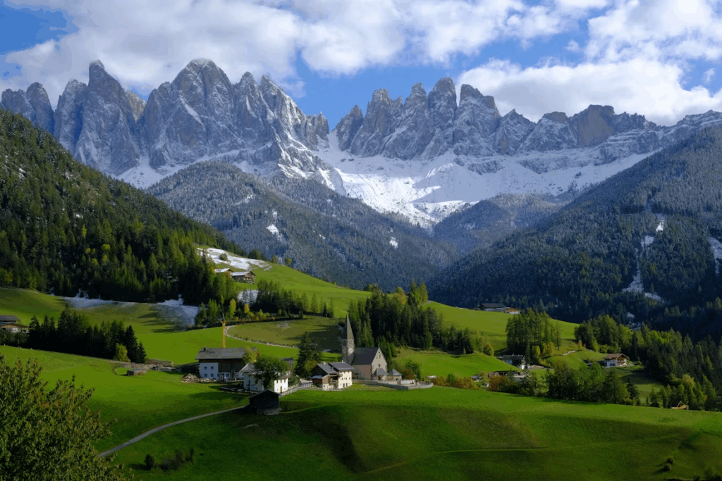 What is the Best Way to Travel Through Italy? 2025 Guide 6 Green grass field near snow covered mountain during daytime