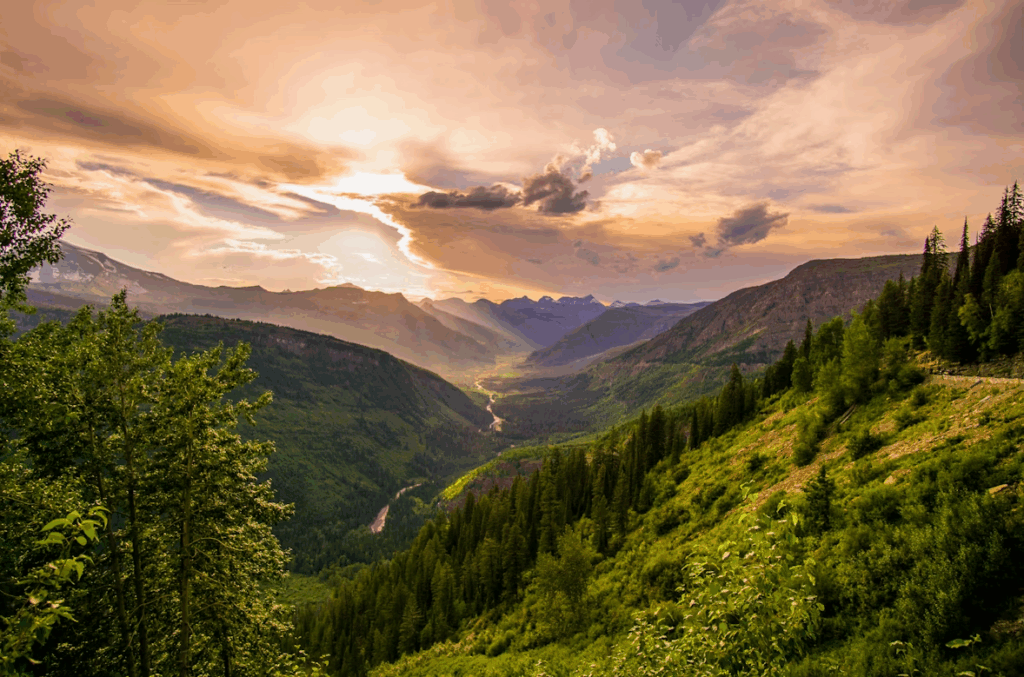 river and mountain ranges under white clouds