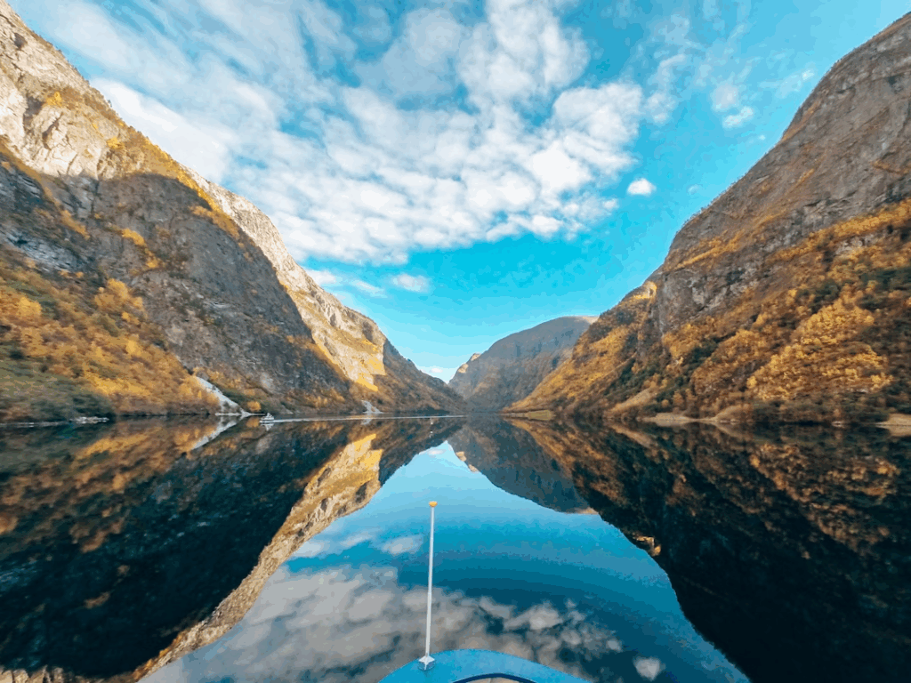 5 Powerful Kayaking in the Norwegian Fjords Experiences Now 3 body-of-water-surrounded-by-rocky-mountains