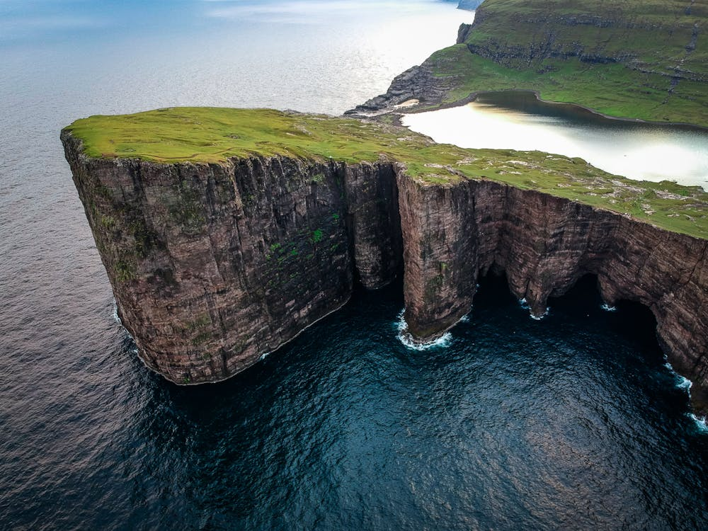 10 stunning Facts Why Faroe Islands Are a Dream Photo Spot 3 aerial-shot-of-cliff