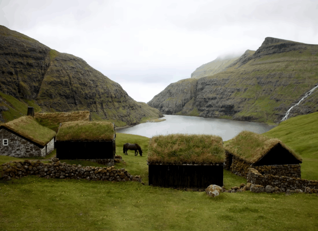 10 stunning Facts Why Faroe Islands Are a Dream Photo Spot 5 brown-wooden-house-near-green-mountain-during-daytime