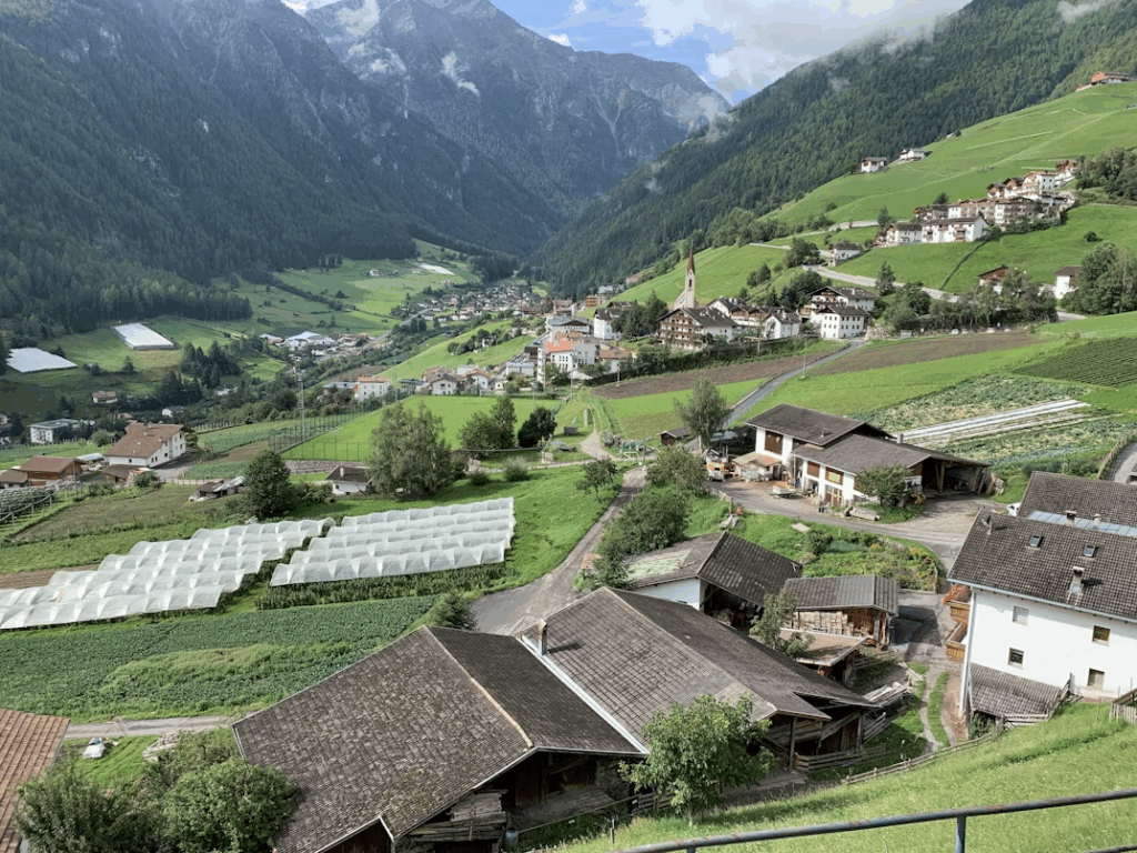 Top 9 Best Traditional Villages in the Italian Alps Revealed 6 houses-on-green-grass-field-near-mountains-during-daytime