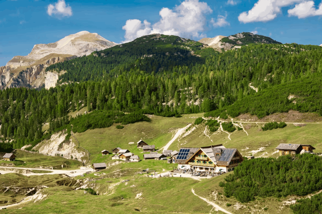 Top 9 Best Traditional Villages in the Italian Alps Revealed 2 a-small-village-in-the-mountains-with-a-mountain-in-the-background